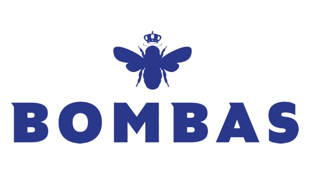 The image shows the Bombas logo with a blue bee wearing a crown above the word BOMBAS in bold blue capital letters on a white background.